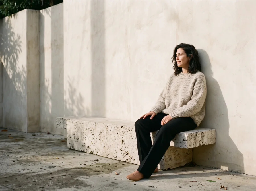 The Mode House knitwear editorial in a sunlit architectural setting